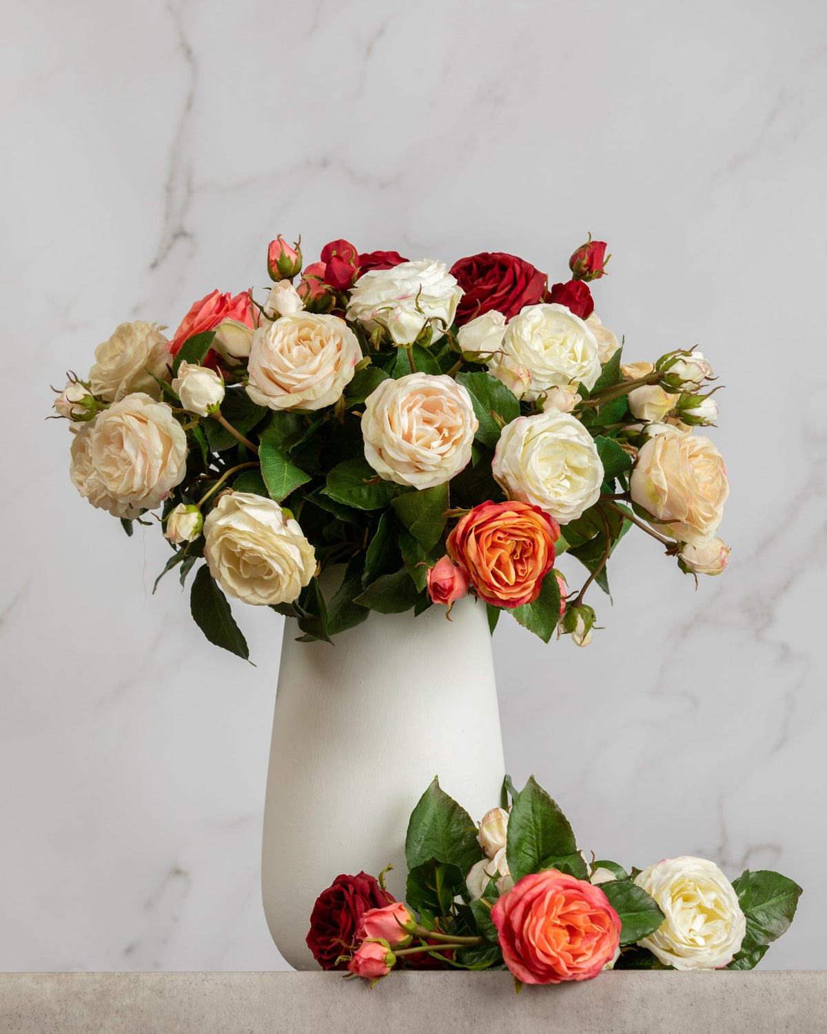 Prestige Botanicals Artificial Red, White, Orange and Pink Ecuadorian Roses in a white vase
