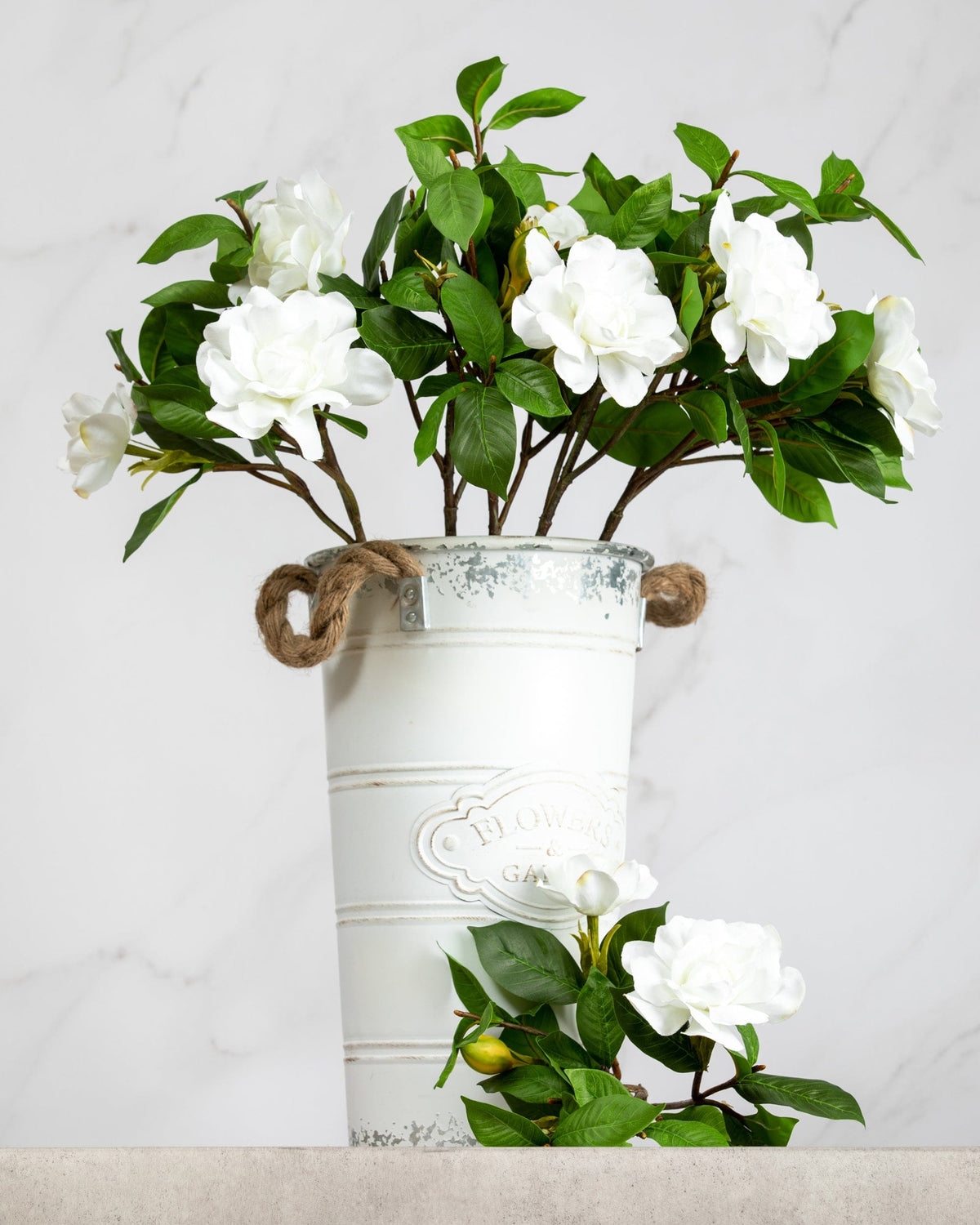 Prestige Botanicals Artificial White Gardenia stems in a white tin vase